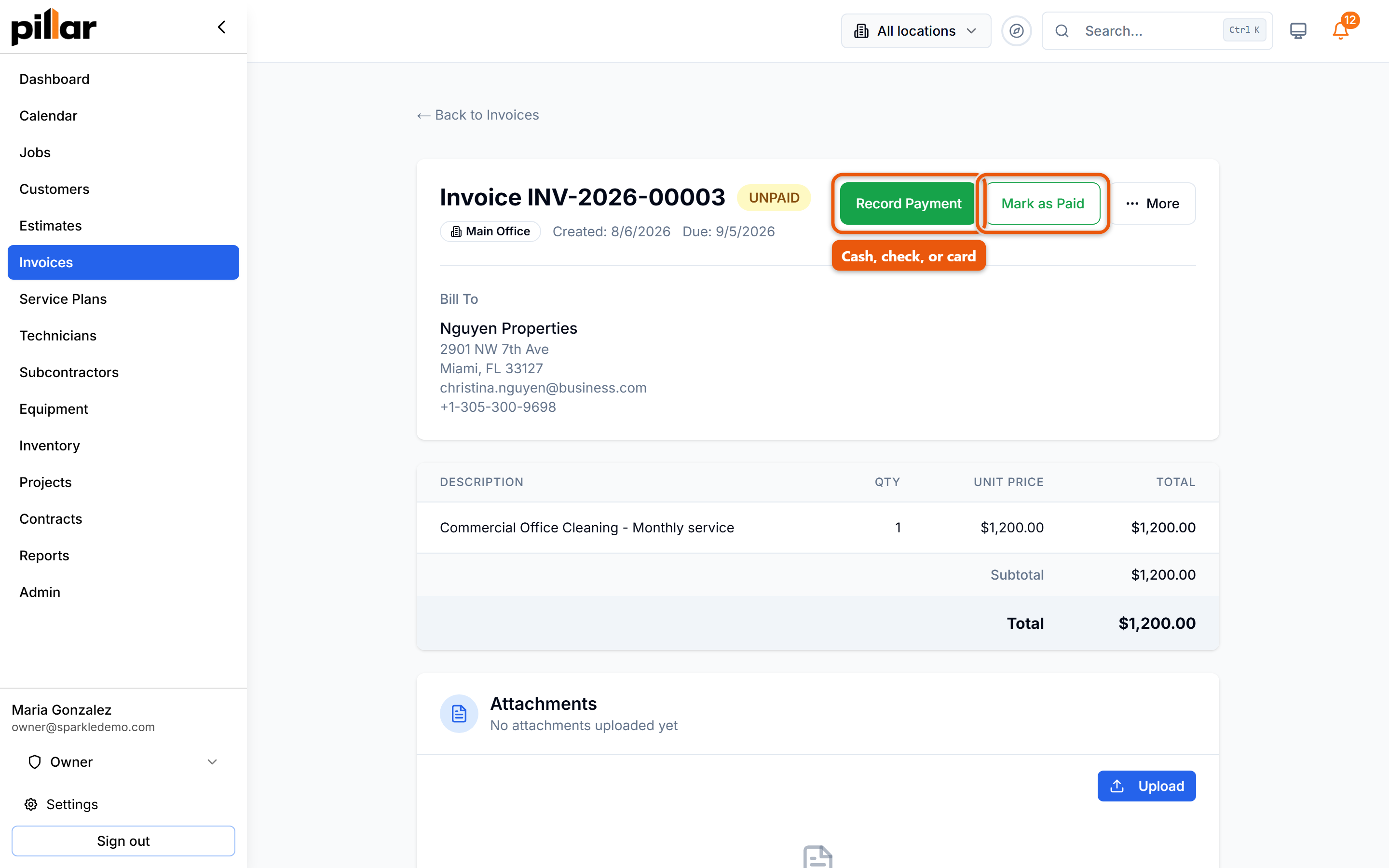 An unpaid invoice with the Record Payment and Mark as Paid buttons highlighted